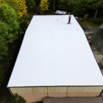 Completed white single-ply TPO roof at Haven of Rest in Auburn, WA