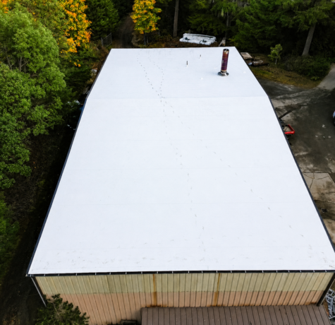 Completed white single-ply TPO roof at Haven of Rest in Auburn, WA