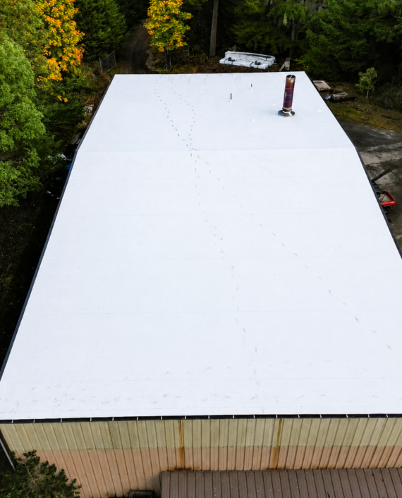 Completed white single-ply TPO roof at Haven of Rest in Auburn, WA