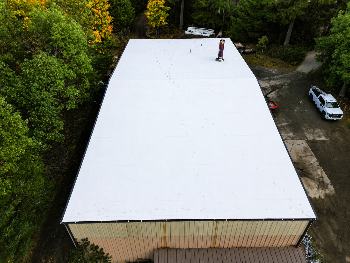 Completed white single-ply TPO roof at Haven of Rest in Auburn, WA