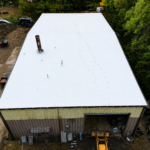 Restored white TPO roof, long elevation