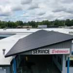 New standing-seam metal service-entrance canopy after