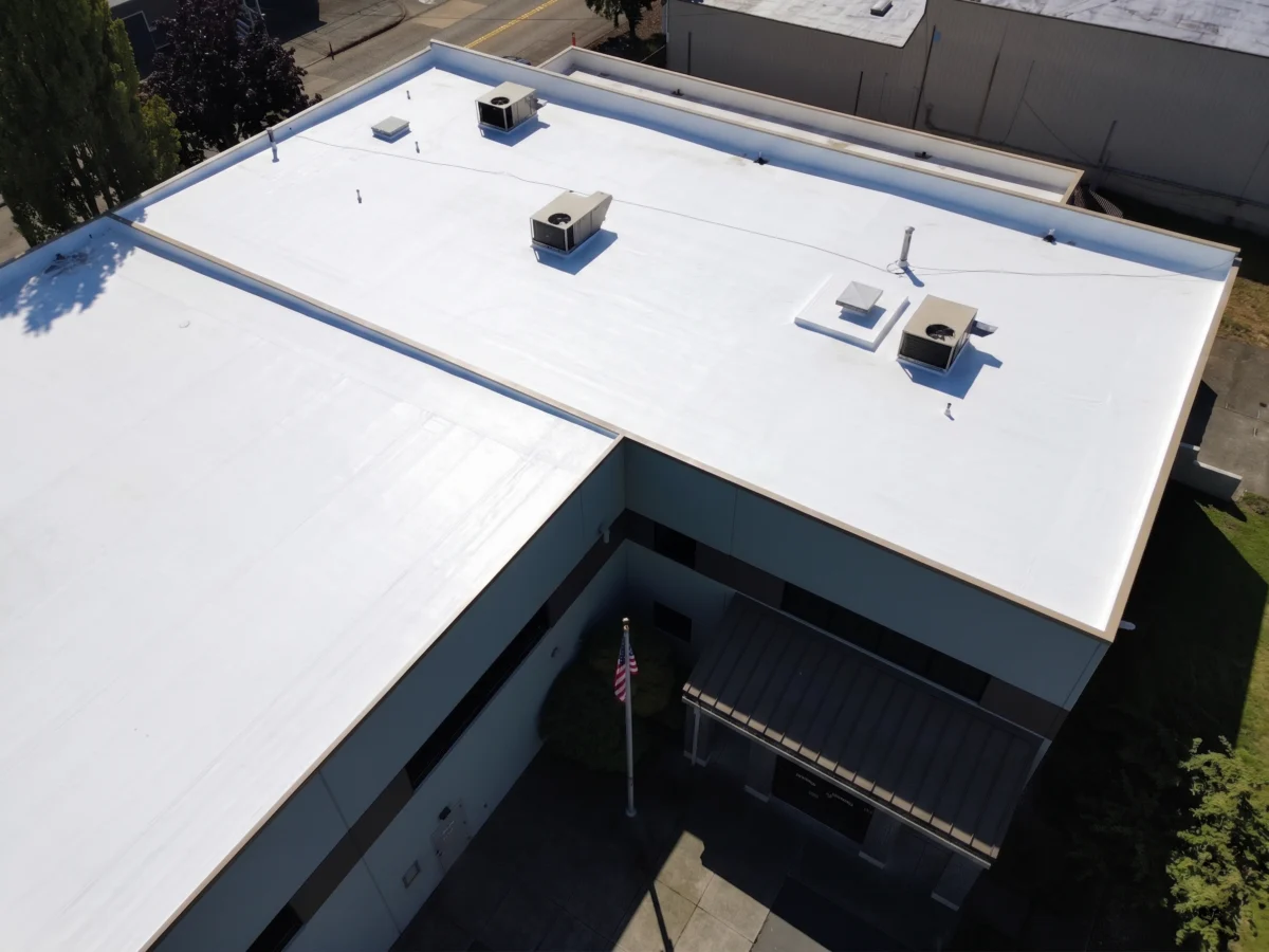 Completed white TPO overlay roof at Demgy Pacific in Tacoma, WA