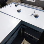 Completed white TPO overlay roof at Demgy Pacific in Tacoma, WA