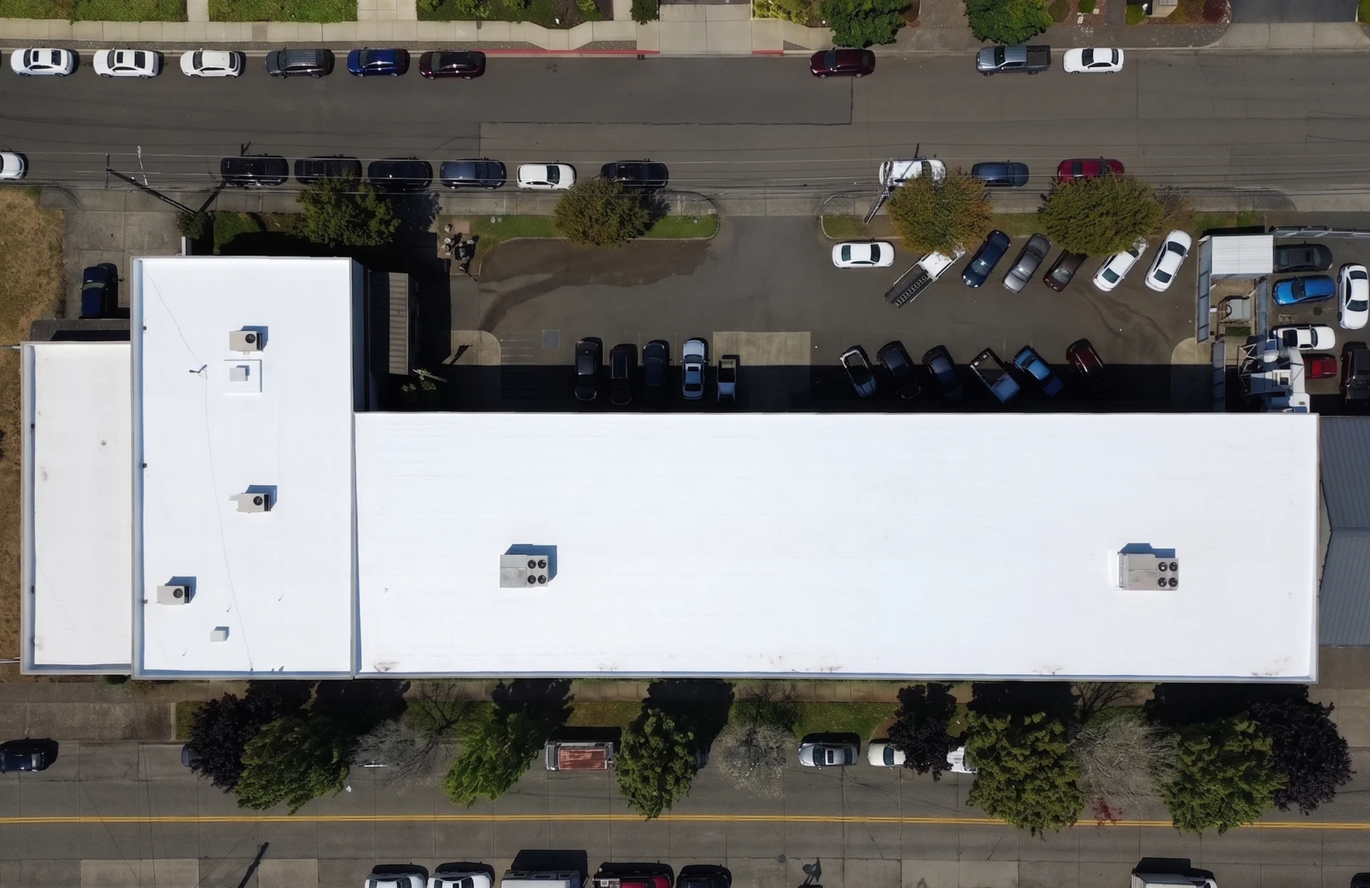 Restored white TPO overlay roof, top-down aerial